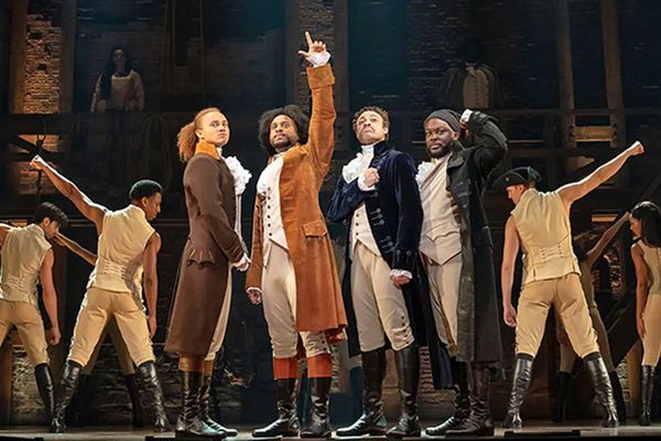 The cast of "Hamilton" on stage.